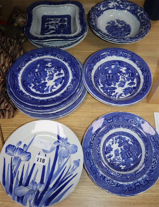 A set of six blue and white Iris plates and a collection of Willow pattern ceramics